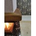 Пристенно-угловой камин из мраморов Сенти Флаверс и Волокас с дубовой балкой